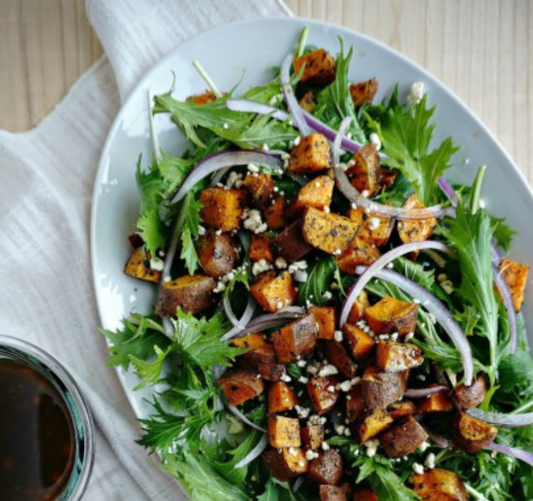 Roasted sweet potato and mizuna salad